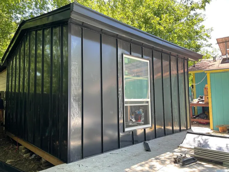 Black standing seam metal wall panels for Roof Inspection in Grosse Pointe