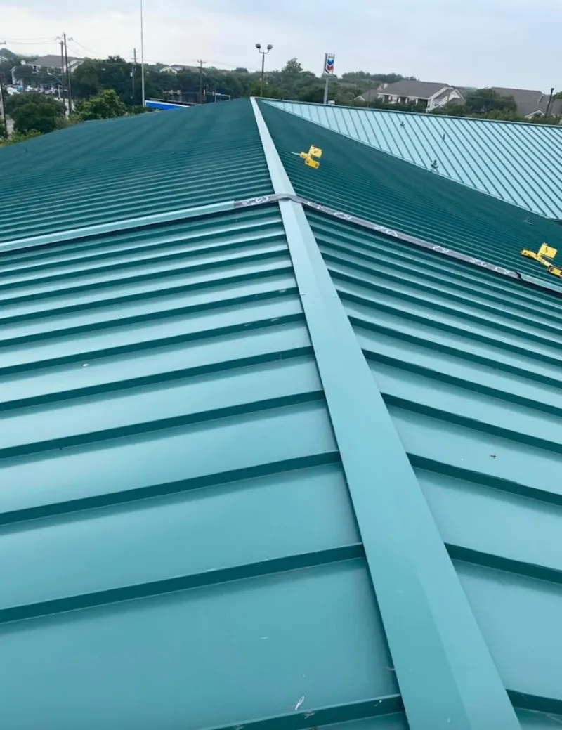 Green commercial metal roof ridge and valley for Metal Roof Repair in Grosse Pointe