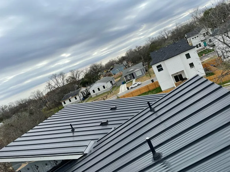 Standing seam metal roof panels with vents for Skylight Repair in Grosse Pointe